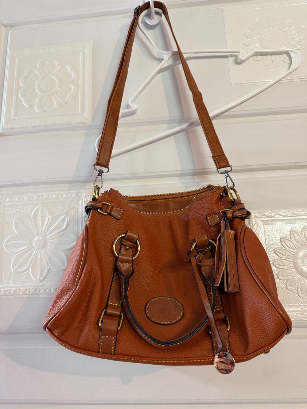 Cute little brownish bag with adjustable straps